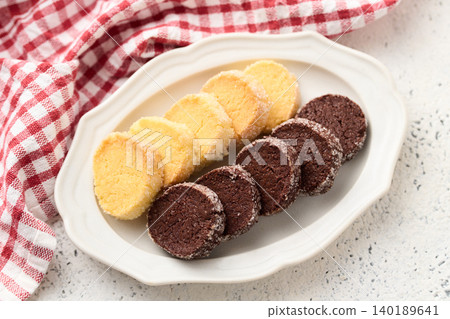 Diamant cookies arranged on a plate: vanilla and cocoa Diamant cookies arranged on a plate: vanilla and cocoa 140189641