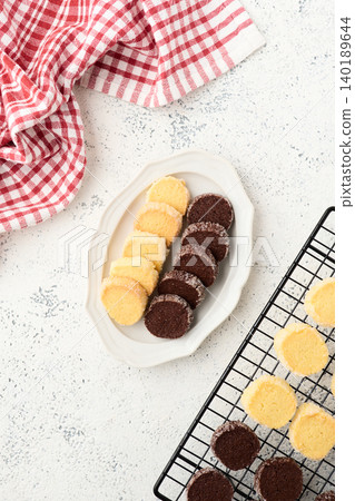 Diamant cookies arranged on a plate: vanilla and cocoa Diamant cookies arranged on a plate: vanilla and cocoa 140189644