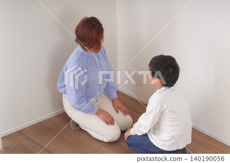 A mother who supports her anxious child A mother who supports her anxious child 140190056