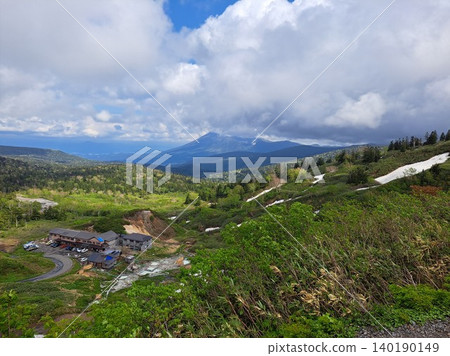 Mount Iwate, a magnificent peak, and a secluded hot spring as seen from Hachimantai. Mount Iwate, a magnificent peak, and a secluded hot spring as seen from Hachimantai. 140190149