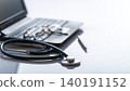 Healthcare background of stethoscope laptop glasses and pen on table with copy-space 140191152