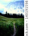 A road that continues through the mountains 140191598