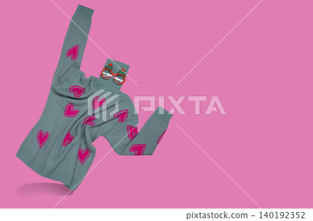 Creative invisible person concept with grey knitted turtleneck sweater and Christmas party glasses levitating on pink background, copy space. Creative invisible person concept with grey knitted turtleneck sweater and Christmas party glasses levitating on pink background, copy space. 140192352