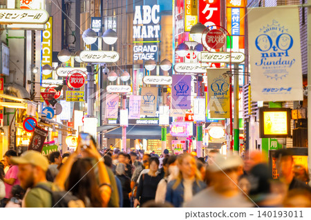 Night view of Shibuya Center Street, bustling with Japanese and foreigners - 2026 140193011