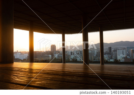 Sunset over Hiroshima city as seen from the rooftop observation deck of Orizuru Tower Sunset over Hiroshima city as seen from the rooftop observation deck of Orizuru Tower 140193051