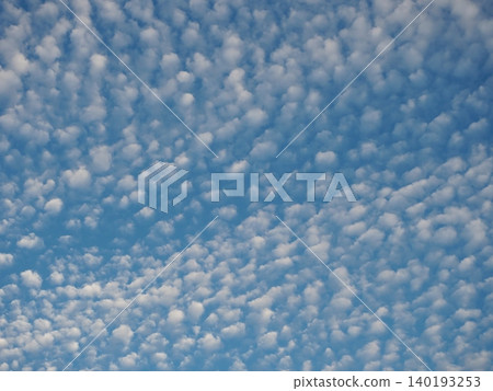 Minimalist natural background material featuring only blue sky and clouds. Minimalist natural background material featuring only blue sky and clouds. 140193253