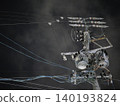 The silent silhouettes of utility poles and power lines stretching into the night sky. 140193824
