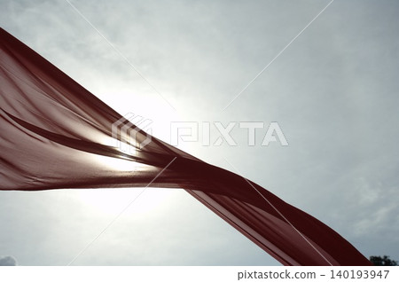 Red Color Cloth Flying In Wind Red Color Cloth Flying In Wind 140193947