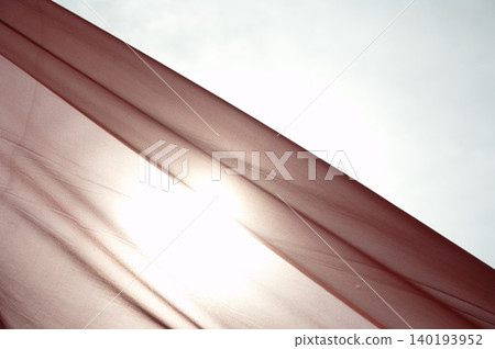 Red Color Cloth Flying In Wind Red Color Cloth Flying In Wind 140193952