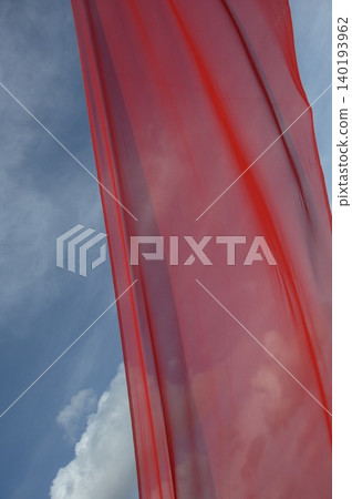 Red Color Cloth Flying In Wind Red Color Cloth Flying In Wind 140193962