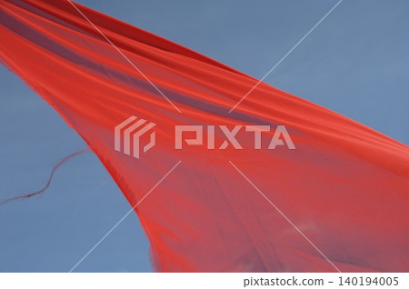 Red Color Cloth Flying In Wind Red Color Cloth Flying In Wind 140194005