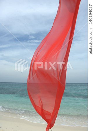Red Color Cloth Flying In Wind Red Color Cloth Flying In Wind 140194037