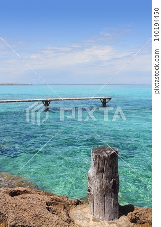Formentera Illetes turquoise sea wooden pier Formentera Illetes turquoise sea wooden pier 140194450