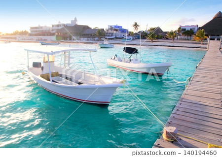 Puerto Morelos beach boats pier Mayan Riviera 140194460