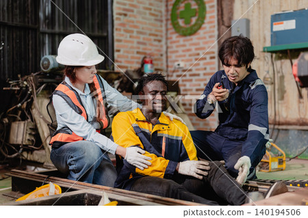 Accident worker injured on site colleague help assist, urgency workplace safety, emergency response. Accident worker injured on site colleague help assist, urgency workplace safety, emergency response. 140194506