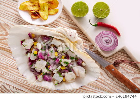 Ceviche peruvian recipe with fried banana Ceviche peruvian recipe with fried banana 140194744