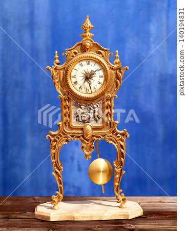 ancient vintage golden brass pendulum clock ancient vintage golden brass pendulum clock 140194831