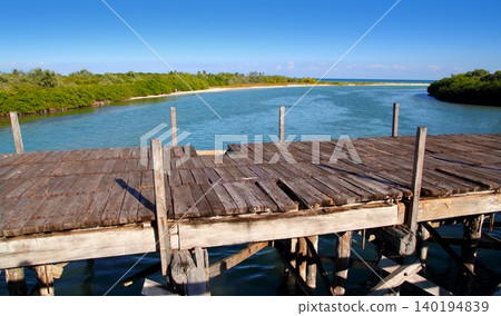 aged tropical wood bridge in Sian Kaan Tulum aged tropical wood bridge in Sian Kaan Tulum 140194839