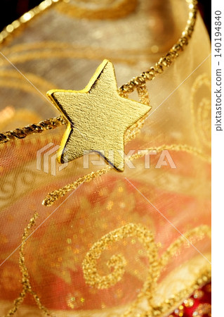 Christmas golden decoration with gold star Christmas golden decoration with gold star 140194840