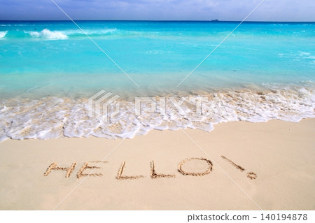 Hello message spell written in tropical beach sand 140194878