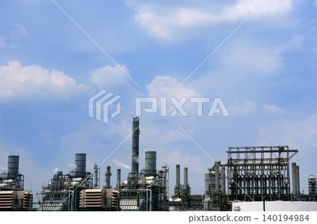 Oil industry installation, metal skyline blue sky 140194984