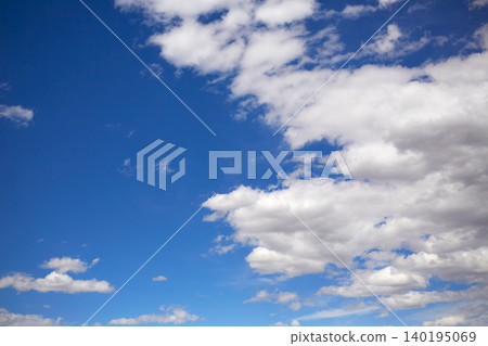 Blue summer sky with white clouds 140195069