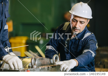 Engineer worker team service injection mold, Professional men work in die casting plant mold service Engineer worker team service injection mold, Professional men work in die casting plant mold service 140195149