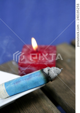 Natural theraphy, stones, and candles over wood Natural theraphy, stones, and candles over wood 140195258