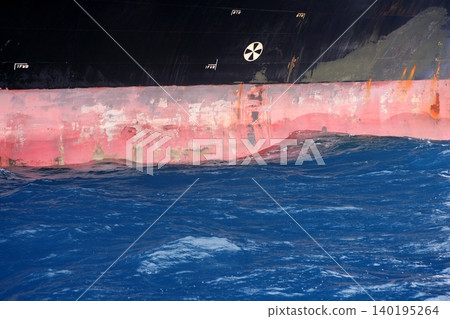 Anchored steel boat starboard side detail Anchored steel boat starboard side detail 140195264