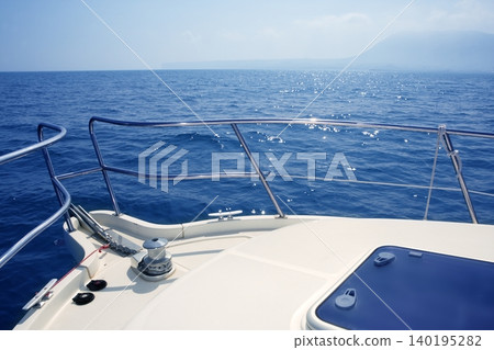 boat bow sailing sea with anchor chain winch boat bow sailing sea with anchor chain winch 140195282