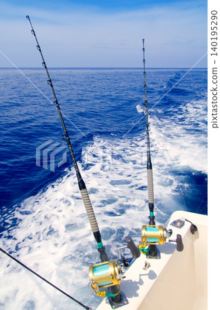 boat fishing trolling in deep blue sea boat fishing trolling in deep blue sea 140195290