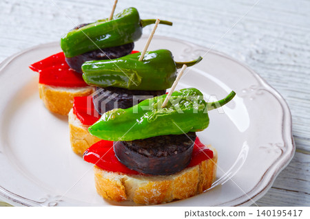 pinchos Burgos morcilla with padron pepper pinchos Burgos morcilla with padron pepper 140195417