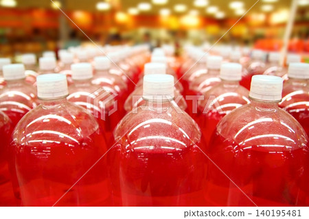 assembly line bottle red liquid rows lines 140195481