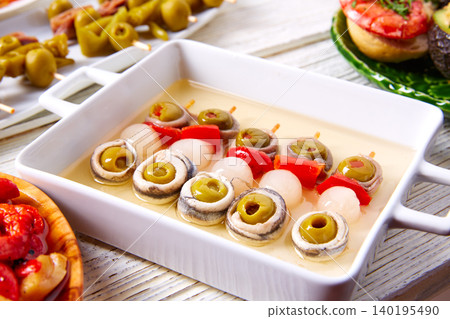 Olives anchovies and picked onion pinchos 140195490
