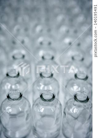 Glass transparent empty bottles assembly line Glass transparent empty bottles assembly line 140195491