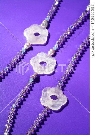 Color stones jewelry necklaces, purple background Color stones jewelry necklaces, purple background 140195598