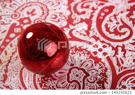 Chrsitmas red ball over indian pattern Chrsitmas red ball over indian pattern 140195621