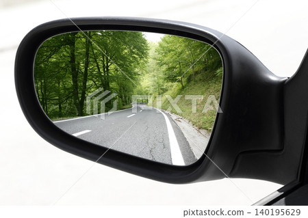 rearview car driving mirror view forest road rearview car driving mirror view forest road 140195629