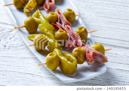 Gilda pinchos with olives and anchovies tapas Gilda pinchos with olives and anchovies tapas 140195655
