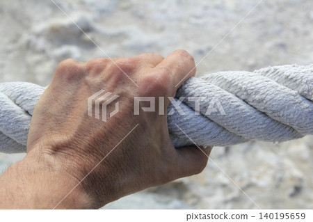 man hand grab grip strong big aged rope man hand grab grip strong big aged rope 140195659