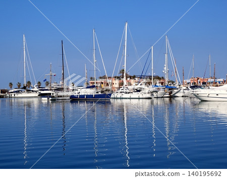 Boats in blue marina Mediterranean sea Denia Boats in blue marina Mediterranean sea Denia 140195692