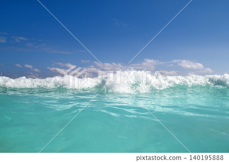 blue turquoise wave caribbean sea water foam 140195888