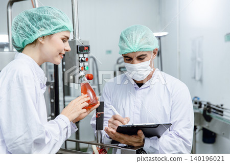 Quality control, Food safety team inspection product standard in beverage industry factory line Quality control, Food safety team inspection product standard in beverage industry factory line 140196021
