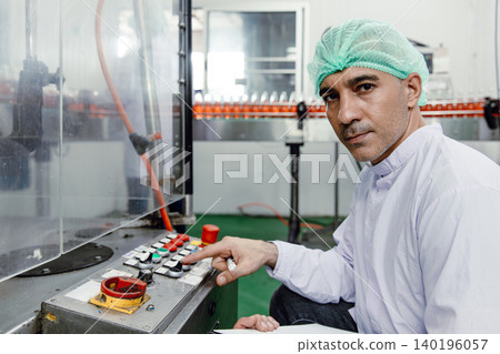 Factory engineer technician working machine operate setting in food and drink factory with hygiene 140196057
