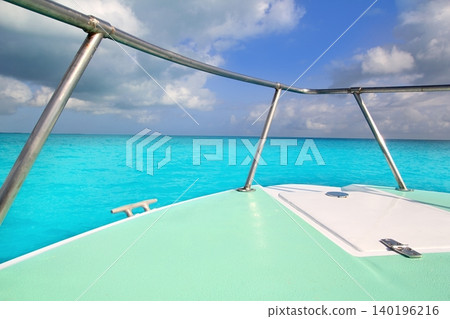 boat green bow in turquoise caribbean sea boat green bow in turquoise caribbean sea 140196216
