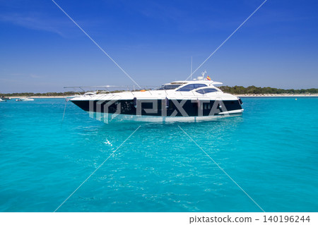 yatch in turquoise beach of Formentera yatch in turquoise beach of Formentera 140196244