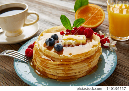 pancakes breakfast syrup coffe and orange juice pancakes breakfast syrup coffe and orange juice 140196537