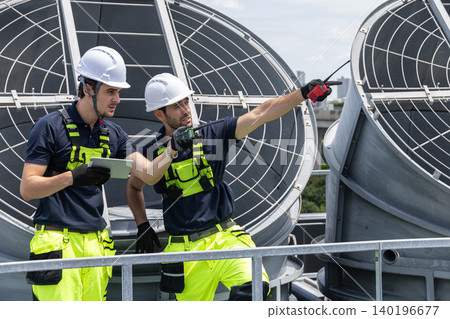 Professional Worker Teamwork Servicing HVAC building cooling tower, Industry air conditioner service Professional Worker Teamwork Servicing HVAC building cooling tower, Industry air conditioner service 140196677
