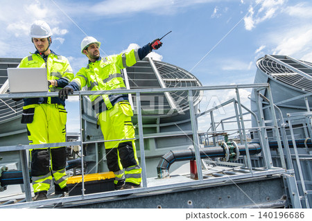 Professional Worker Teamwork Servicing HVAC building cooling tower, Industry air conditioner service Professional Worker Teamwork Servicing HVAC building cooling tower, Industry air conditioner service 140196686