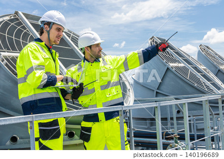 Professional Worker Teamwork Servicing HVAC building cooling tower, Industry air conditioner service Professional Worker Teamwork Servicing HVAC building cooling tower, Industry air conditioner service 140196689